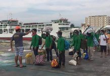 Some stranded “sacadas” or migrant sugar workers in Negros Occidental wait to board a vessel at the Bredco port to travel back home to Panay in this photo taken last May. Travel and health protocols have been set for their return to Negros Occidental in time for the start of the milling season in September. ADRIAN BOBE VIA PNA