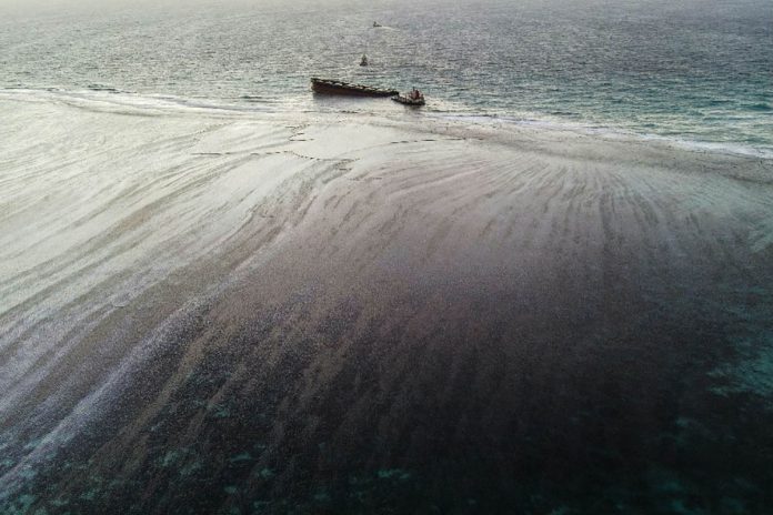 This aerial picture taken on August 16, 2020 shows the MV Wakashio bulk carrier that had run aground and broke into two parts near Blue Bay Marine Park, Mauritius. AFP
