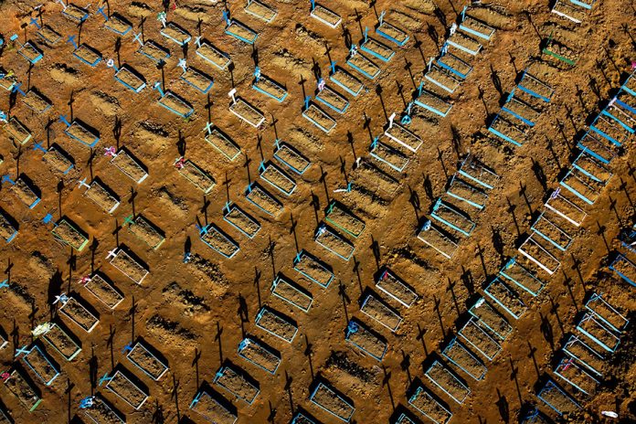 This file photo taken on June 21, 2020 shows an aerial view showing graves in the Nossa Senhora Aparecida cemetery in Manaus, Brazil. This file photo taken on June 21, 2020 shows an aerial view showing graves in the Nossa Senhora Aparecida cemetery in Manaus, Brazil. AFP