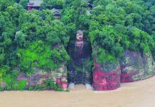 This giant statue of Buddha normally sits high above the waterline but recently waters reached its base and kept rising. The last time the toes of the statue got wet was in 1949. REUTERS