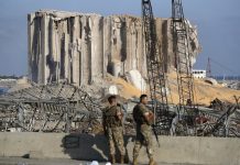 Families of Beirut blast victims plead for outside inquiry In this Aug. 6, 2020 file photo, Lebanese army soldiers stand guard at the scene where an explosion hit on Tuesday the seaport of Beirut, Lebanon. AP/HUSSEIN MALLA