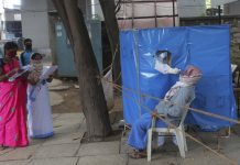 India’s virus caseload tops 3 million A health worker takes a nasal swab sample to test for COVID-19 in Hyderabad, India, Saturday, Aug. 22, 2020. AP
