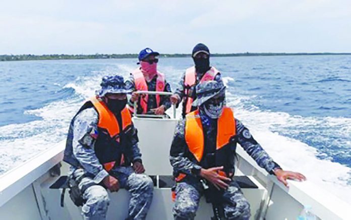 region-negros_C Personnel of the Philippine Coast Guard sub-station in San Carlos City, Negros Occidental patrol the coastal areas of the northern city in this undated photo. Operations have been intensified against the illegal entry of locally-stranded individuals from the neighboring Cebu province. SAN CARLOS CITY INFORMATION OFFICE VIA PNA