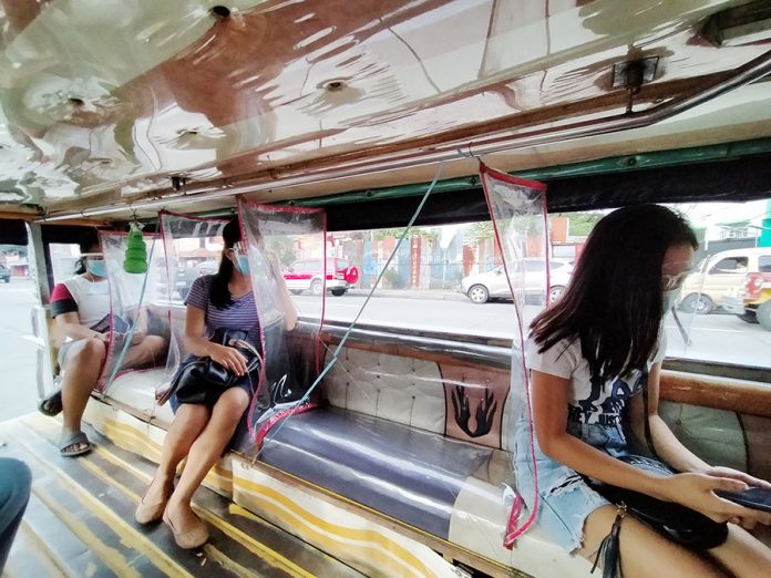 1 meter jeepney Commuters inside a public utility jeepney in Iloilo City keeps a seat-distance away from each as a form of physical distancing to prevent the spread of coronavirus disease 2019 (COVID-19). This new policy, however, would drastically reduce the number of passengers. IAN PAUL CORDERO/PN ONE SEAT APART