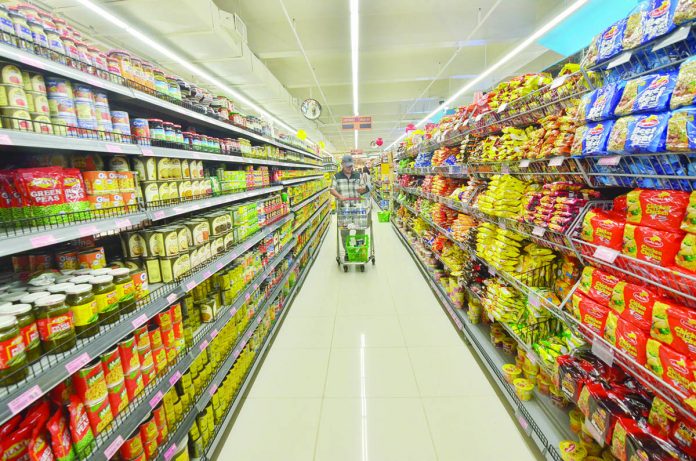 A man shops inside a supermarket in Iloilo City. A man shops inside a supermarket in Iloilo City. IAN PAUL CORDERO