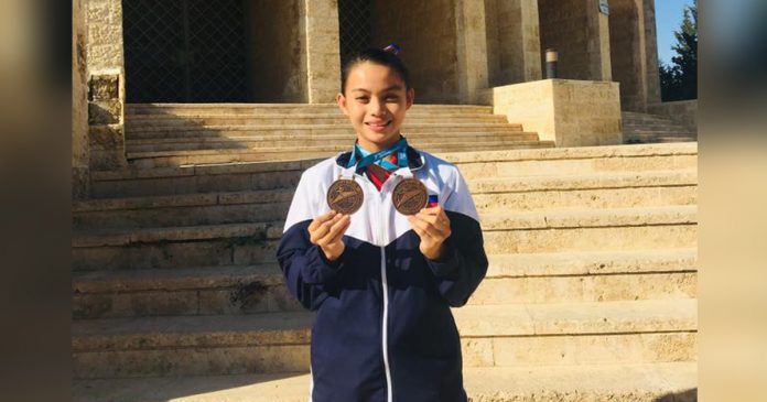 AGALOOS JamieHannah Agaloos took home gold in an online poomsae tournament recently. PHOTO COURTESY OF JAMIEHANNAH AGALOOS