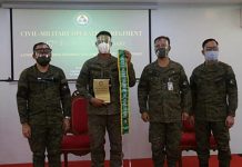 Negros-based 14th CMO Battalion, 2 ‘Marawi heroes’ receive awards Captain Ariel Lacasandile (2nd from left), 14th Civil-Military Operations (CMO) Battalion operations officer, receives the award of the unit as Best CMO Battalion of the Year for 2020 from Colonel Arvin Lagamon (left), commander of CMO Regiment (CMOR), Philippine Army on Aug. 28. The awarding ceremony was part of the CMOR’s 67th Founding Anniversary celebration held at its headquarters in Fort Bonifacio, Taguig City. 14TH CMO BATTALION VIA PNA