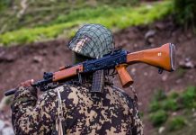 China says Indian forces crossed border, fired warning shots Photo shows an Indian Border Security Force guard near the India-China border. GETTY