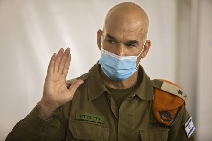 Maj. Gen. Ori Gordin, head of the Israeli army’s Maj. Gen. Ori Gordin, head of the Israeli army’s Home Front Command, gestures as he speaks at its headquarters, in Ramle, Central Israel, Tuesday, Aug. 25, 2020. AP