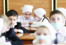 Russia’s virus cases exceed 1 million, globally 4th highest Pupils wearing face masks to protect against coronavirus sit in a classroom during a ceremony marking the start of classes at a school as part of the traditional opening of the school year known as "Day of Knowledge" in Grozny, Russia, Tuesday, Sept. 1, 2020. Across the country, schools start their usually festive opening day on Sept. 1. AP