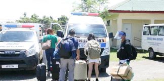 Antiqueño repatriates are being fetched by an ambulance from their respective local government units in Antique Airport. The coming home of Antiqueños was made possible through the "Libre Uli Antique" program, a joint undertaking of Gov. Rhodora Cadiao and Lone District Rep. Loren Legarda. CONTRIUBTED PHOTO