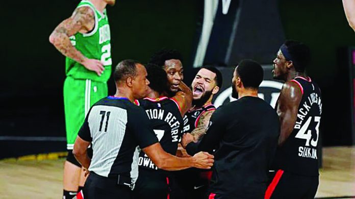Toronto Raptors’ Ogugua Anunoby was mobbed by his teammates after draining a game-winning triple at the buzzer. Toronto Raptors’ Ogugua Anunoby was mobbed by his teammates after draining a game-winning triple at the buzzer. AP