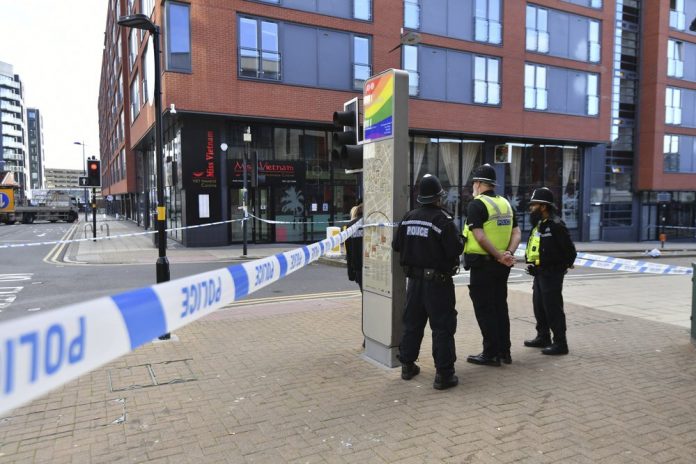 uk stabbing A police officer and vehicles are seen at a cordon in Irving Street in Birmingham after a number of people were stabbed in the city centre, Sunday, Sept. 6, 2020. JACOB KING/PA VIA AP