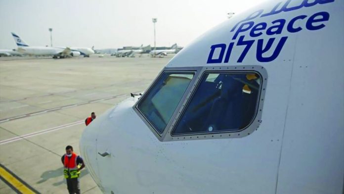 World - Israel-UAE_C The El Al plane is marked with the word “peace” in Arabic, English and Hebrew. EPA