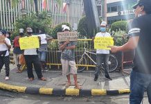 Displaced public utility jeepney drivers and operators protest in front of the old Bacolod City Hall. They demand for the resumption of jeepney operations halted due to the modified enhanced community quarantine being observed in the metro.
