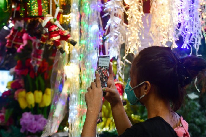 ABS-CBN A stall in Quezon City utilizes various online platforms to sell various Christmas decor on Sept. 1, 2020. The stall has turned to online selling to cope with the low physical store sales due to the pandemic. A stall in Quezon City utilizes various online platforms to sell various Christmas decor on Sept. 1, 2020. The stall has turned to online selling to cope with the low physical store sales due to the pandemic. ABS-CBN