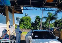 Drive-thru COVID test site opens in Bago City A motorist gets tested for coronavirus disease 2019 at a drive-through at the ABAP gym in Bago City, Negros Occidental. Glenly Casona, swab team leader and medical technologist of the City Health Office, says the target individuals will be swabbed inside their own vehicles. BAGO CITY PIO