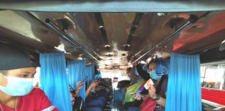 IS THIS TOO CLOSE FOR COMFORT? Non-porous curtains separate anxious passengers of this public utility jeepney in Iloilo City to prevent coronavirus transmission. The Department of Transportation is easing physical distancing in public utility vehicles. Not everyone is happy. COVID-19 spreads mainly among people who are in close contact for a prolonged period. Spread happens when an infected person coughs, sneezes or talks, and droplets from their mouth or nose are launched into the air and land in the mouths or noses of people nearby. IAN PAUL CORDERO/PN