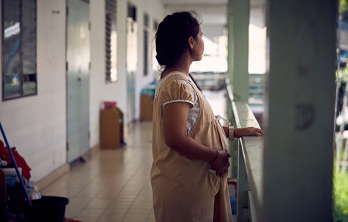 Pregnant Woman A report from the Commission on Population and Development reveals that among teenage girls who get pregnant, 80 percent have partners aged 21 years old and above. RUTH CARR /NFPA