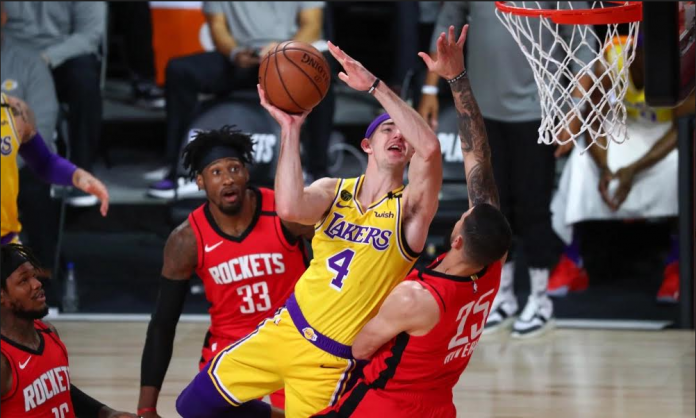 nba Los Angeles Lakers’ Alex Caruso attacks the defense of Houston Rockets’ Austin Rivers for an inside hit. USA TODAY PHOTO