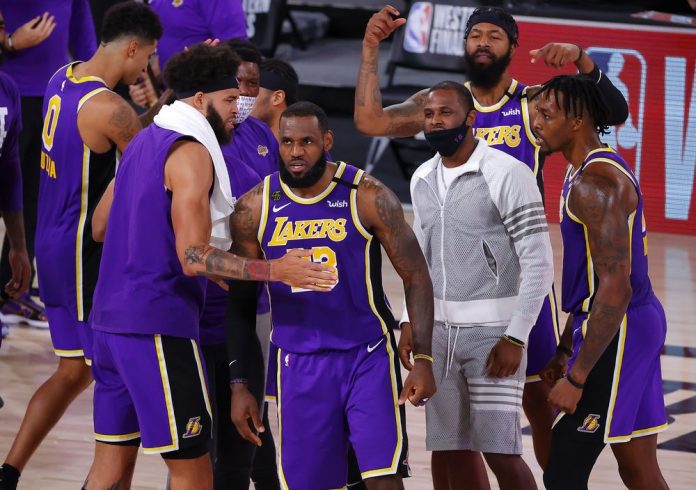 Lakers off to NBA finals LeBron James celebrates with Los Angeles Lakers teammates after their Game 5 win against Denver Nuggets. PHOTO COURTESY OF KEVIN C. COX/GETTY IMAGES
