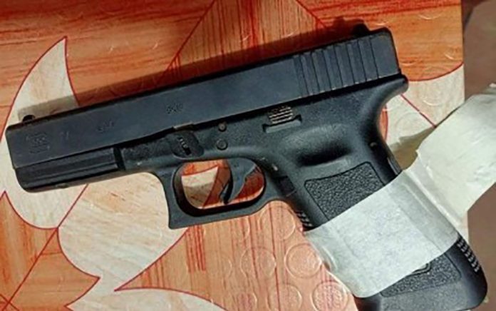 RECOVERED The Glock pistol issued to the late police chief of Guihulngan City, Negros Oriental, Superintendent Arnel Arpon, was recovered from a suspected New People’s Army leader who was arrested in a joint military and police operation on Sept. 20. RECOVERED The Glock pistol issued to the late police chief of Guihulngan City, Negros Oriental, Superintendent Arnel Arpon, was recovered from a suspected New People’s Army leader who was arrested in a joint military and police operation on Sept. 20.