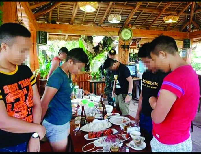 These neophyte policewomen were caught drinking in a public in Barangay Pasig, Sara, Iloilo on Sept. 12. SARA POLICE STATION