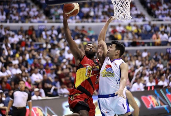 San Miguel Beermen’s Moala Tautuaa attacks the defense of Magnolia Hotshots’ Jackson Corpuz for an inside hit during their 2020 PBA Philippine Cup game on March 8. The Beermen won, 94-78. PBA PHOTO San Miguel Beermen’s Moala Tautuaa attacks the defense of Magnolia Hotshots’ Jackson Corpuz for an inside hit during their 2020 PBA Philippine Cup game on March 8. The Beermen won, 94-78. PBA PHOTO