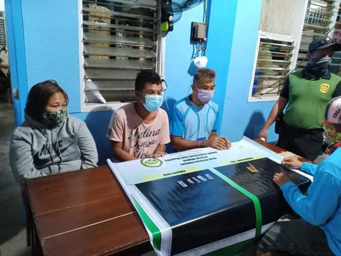 region-guimaras Antidrug personnel conduct an inventory of items seized from Gina Rose Estruche along with Rainheart and Remy Diamante, who were nabbed in a buy-bust operation in Barangay Avila, Buenavista, Guimaras on Sept. 2. PDEA REGION VI