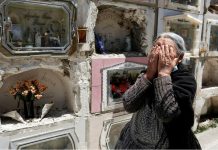 Global coronavirus death toll passes 1 million A woman reacts next to the grave of her husband as the General Cemetery was reopened for visitors in La Paz, Bolivia. DAVID MERCADO, REUTERS