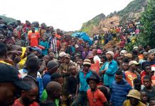 Around 50 feared dead in DR Congo mine collapse People gather at the scene of a gold mine collapse near the town of Kamituga, South Kivu province, in eastern Congo Friday, Sept. 11, 2020. JEFF MWENYEMALI, MAISHA RDC/AP