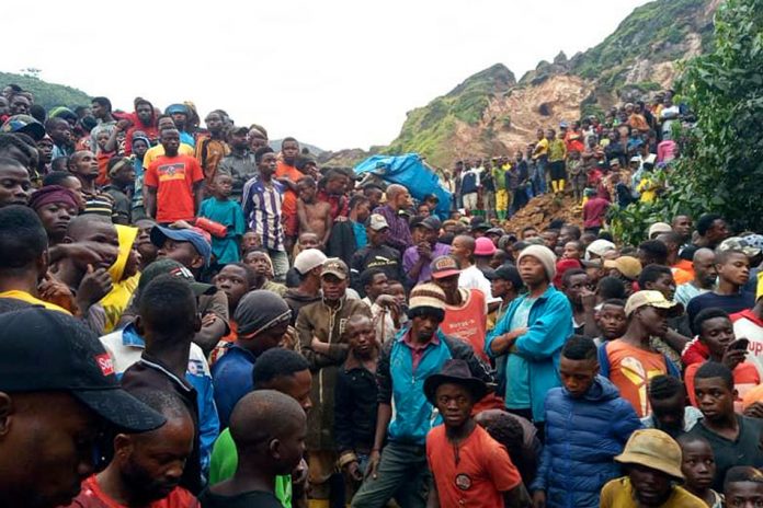 Gold Mine DR Congo People gather at the scene of a gold mine collapse near the town of Kamituga, South Kivu province, in eastern Congo Friday, Sept. 11, 2020. JEFF MWENYEMALI, MAISHA RDC/AP