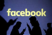 Facebook suspends fake Russian accounts, warns of US election hack-and-leak threat Silhouettes of mobile users are seen next to a screen projection of Facebook logo.DADO RUVIC/REUTERS