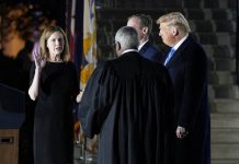 Barrett confirmed by Senate for Supreme Court, takes oath President Donald Trump watches as Supreme Court Justice Clarence Thomas administers the Constitutional Oath to Amy Coney Barrett on the South Lawn of the White House in Washington, United States on Oct. 26, 2020. PATRICK SEMANSKY/AP PHOTO