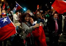 Jubilation as Chile votes to rewrite constitution Thousands of people gather to celebrate in major Chilean cities. REUTERS