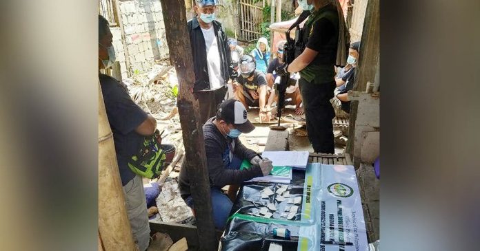 drugDen Antidrug operatives conduct an inventory of the suspected illegal drugs seized in a drug den in Barangay 6, San Carlos City, Negros Occidental. PDEA-6