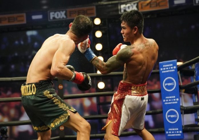 magsaylo Filipino boxer Mark Magsayo connects a left uppercut on Mexican Rigoberto Hermosillo. SEAN MICHAEL HAM/TGB PROMOTIONS