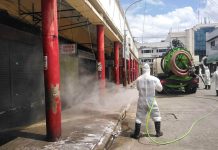 While Burgos Market in Bacolod City is temporary shutdown, personnel of the Disaster Risk Reduction and Management council conduct disinfection as part precautionary measures against coronavirus. The city government will be “pool testing” vendors of the metro’s three major markets. BACOLOD CITY DRRMO