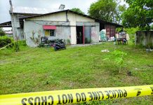 Drug surrenderer gunned down inside Oton house Policemen cordon the front portion of Aquiles Po’s house. Po was with his live-in partner when shot by an unidentified gunman. IAN PAUL CORDERO/PN