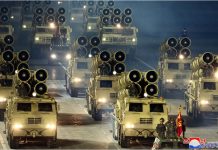 Military vehicles are seen during a parade to mark the 75th anniversary of the founding of the ruling Workers’ Party of Korea, in this image released by North Korea’s Central News Agency on Oct. 10, 2020. KCNA VIA REUTERS