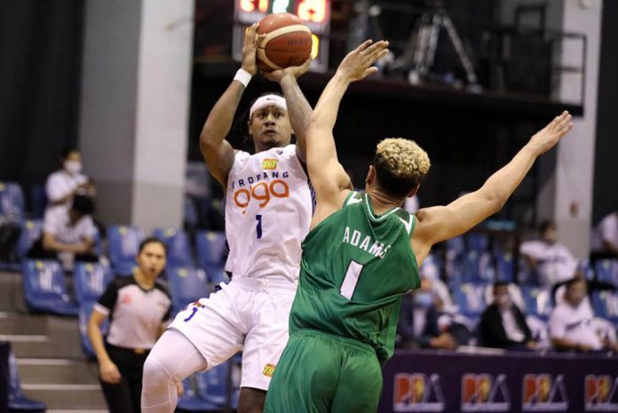 PBA PHOTO TNT Tropang Giga’s Bobby Ray Parks Jr. attempts a fallaway basket against TerraFirma Dyip’s Roosevelt Adams TNT Tropang Giga’s Bobby Ray Parks Jr. attempts a fallaway basket against TerraFirma Dyip’s Roosevelt Adams. PBA PHOTO