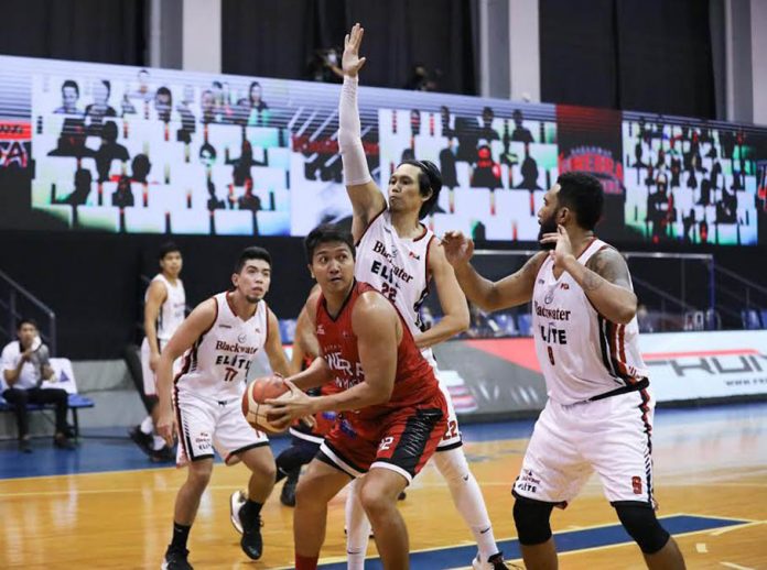 pba Barangay Ginebra San Miguel Kings’ Prince Caperal was clobbered by the defense of Blackwater Elite’s Marion Magat and Rommel Nino Canaleta. PBA PHOTO
