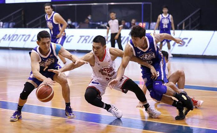 pba Barangay Ginebra San Miguel Kings’ Aljon Mariano tries to control the ball while being bothered by the defense of NLEX Road Warriors’ Kevin Alas and Anthony Semerad. PBA PHOTO