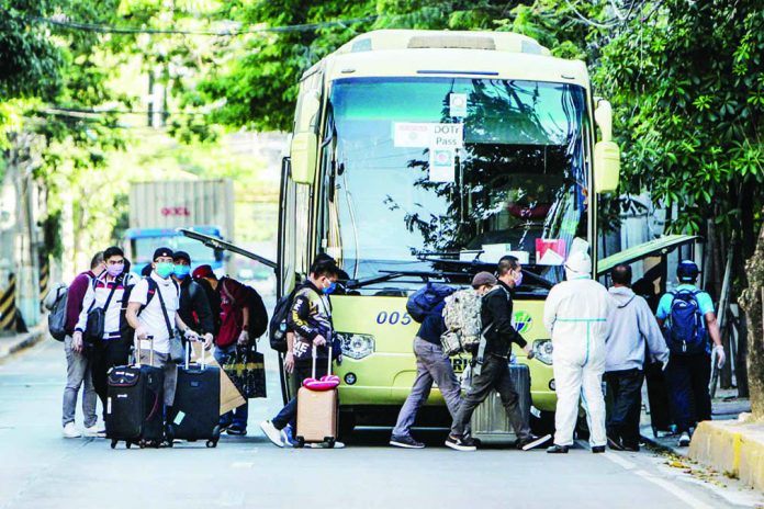 Covid-19 OFW The Department of Health will turn to private testing centers to carry out coronavirus tests for returning overseas Filipino workers, Malacañang said. Photo by Ben Nabong/Rappler