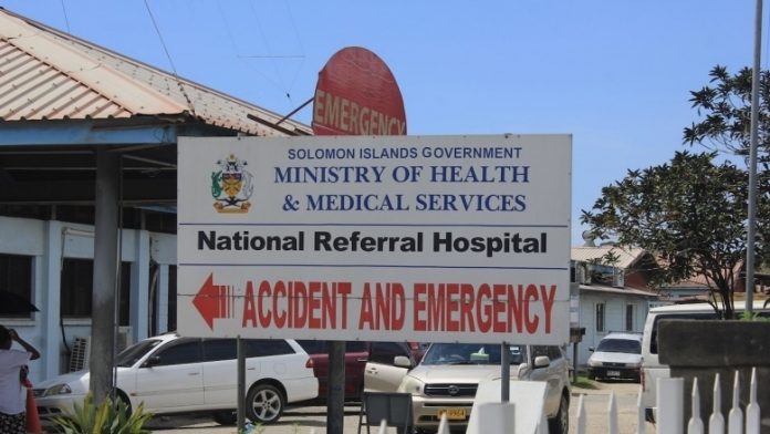 Solomon Islands’ Dual Challenge: Responding to Natural Disaste A road sign points the way to emergency services in Solomon Islands. WORLD BANK
