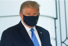 US President Trump wears a face mask as he departs the White House to fly to Walter Reed National Military Medical Center, where it was announced he will work for at least several days after testing positive for COVID-19. REUTERS