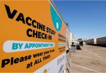 Signs directing arriving patients are shown at a trailer compound after a Phase 3 trial location of Johnson & Johnson’s Janssen vaccine candidate was announced in National City, California, US. MIKE BLAKE, REUTERS