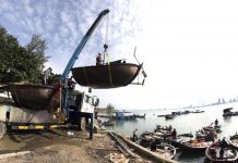 Vietnam evacuating low-lying areas as strong typhoon nears People move fishing boats to save place ahead of Typhoon Molave in Danang, Vietnam on Monday, Oct. 26, 2020. TRAN LE LAM/VNA VIA AP
