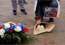 French police target Islamist networks after teacher’s beheading A person holding a picture of Samuel Paty, the French teacher who was beheaded on the streets of the Paris, lays flowers during a tribute in Lille, France, Oct. 18, 2020. PASCAL ROSSIGNOL/REUTERS