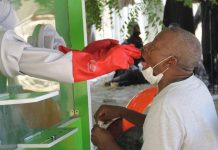 A patient takes a coronavirus test at a hospital in Nigeria. AFP/GETTY IMAGES